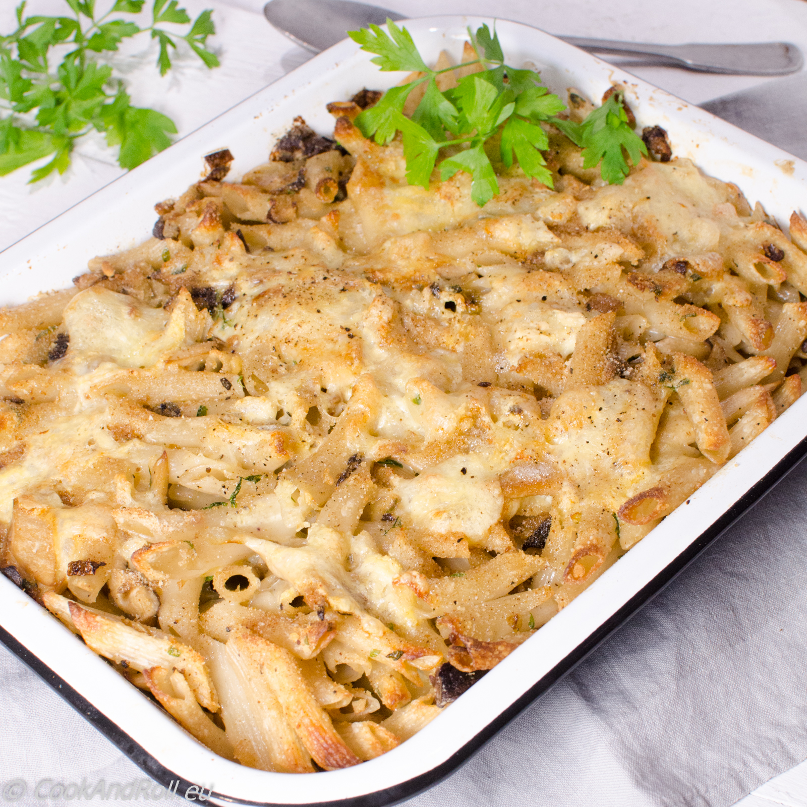 Gegratineerde penne met paddenstoelen en Hervekaas